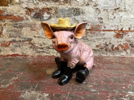 sitting pig with boots